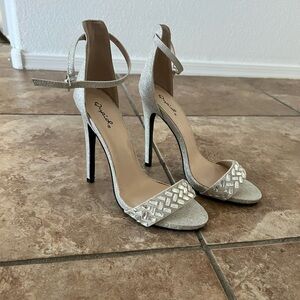 Brand new, never worn silver rhinestone heels
